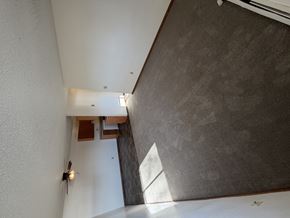 Bismarck apartment for rent - A room with a white ceiling and a grey wall.