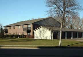 Aberdeen apartment for rent - A large building with a white garage door is in the background.
