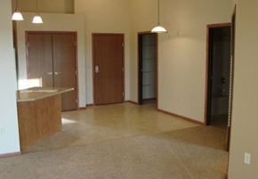 Aberdeen apartment for rent - A room with a brown carpet and a brown door.