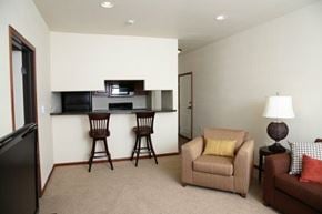 Aberdeen apartment for rent - A living room with a couch, chairs, and a television.
