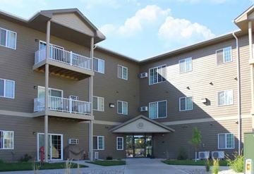 Aberdeen apartment for rent - A large apartment complex with a central courtyard and multiple balconies.