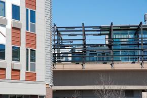 Minneapolis apartment for rent - a balcony on the side of a building with a blue sky