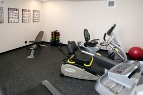 Minneapolis apartment for rent - a gym with a treadmill and other exercise equipment