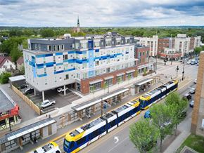 St. Paul apartment for rent - an aerial view of a train station with a train on the tracks