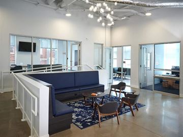 St. Paul apartment for rent - a living room with a blue couch and chairs