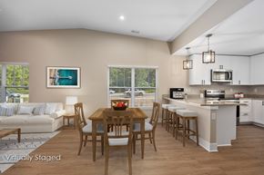 Williamsburg apartment for rent - A kitchen with a table and chairs in the middle of the room.