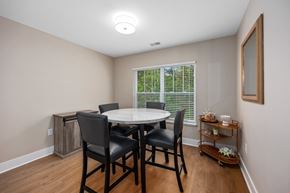 Williamsburg apartment for rent - A dining room with a table and chairs.