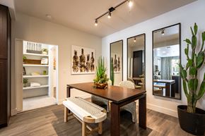San Diego apartment for rent - a dining area with a wooden table and two chairs