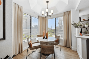Scottsdale apartment for rent - A dining room with a round table and chairs.