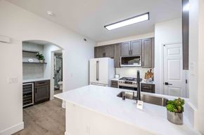 Henderson apartment for rent - a kitchen with a large white counter top and a sink
