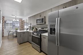 Henderson townhouse for rent - a kitchen with stainless steel appliances and a stainless steel refrigerator