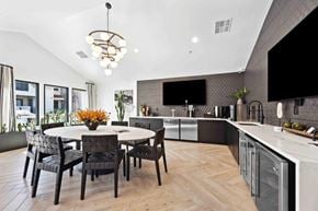 Scottsdale apartment for rent - A modern kitchen with a dining table and chairs.