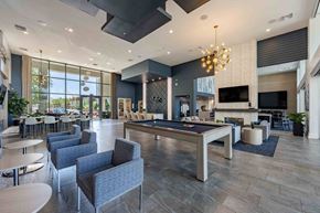 Phoenix apartment for rent - a spacious lobby with a pool table and lounge area
