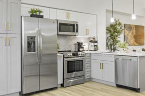 Glendale apartment for rent - a kitchen with stainless steel appliances and white cabinets