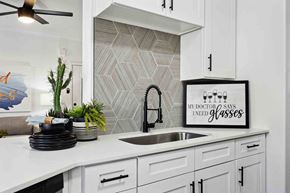 Glendale apartment for rent - a kitchen with white cabinets and a white sink
