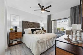 Glendale apartment for rent - a bedroom with a bed and a ceiling fan