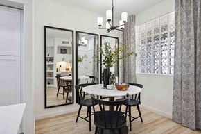 Glendale apartment for rent - a small dining room with a round dining table and black chairs