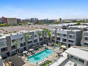 Glendale apartment for rent - an aerial view of an apartment complex with a swimming pool