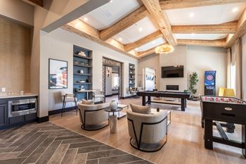 Game room with billiards and shuffleboard