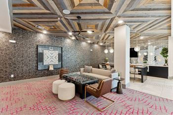 Game room with billiards and shuffleboard