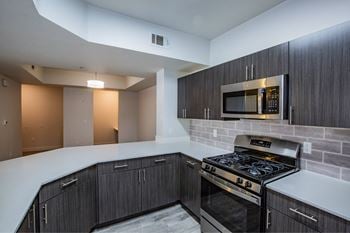 Spacious kitchen with island in select homes