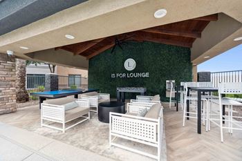 Outdoor lounge with games, fire pit & seating