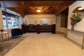 Chicago apartment for rent - the lobby of a hotel with a reception desk