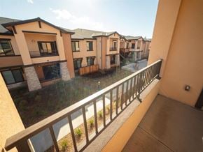 Santa Rosa apartment for rent - A balcony overlooks a row of houses.