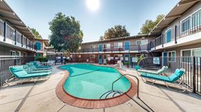 Davis apartment for rent - A sunny day at the pool of a residential complex at Pennsylvania Place, Davis, California