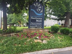 Knoxville apartment for rent - A sign for Sutters Mill Apartment Community Office is shown in front of a building.