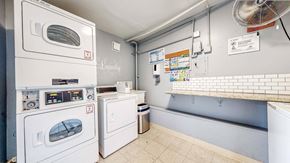 Davis apartment for rent - A laundry room with a washing machine and a dryer at Pennsylvania Place, Davis, CA