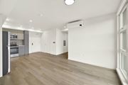 Berkeley apartment for rent - A spacious room with wooden flooring and white walls at 26FIFTY Apartments, Berkeley