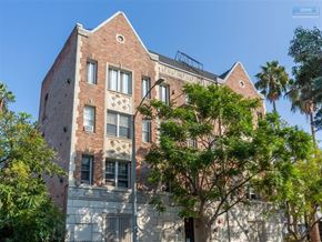 Los Angeles apartment for rent - A tall building with a mix of brick and concrete exterior walls.
