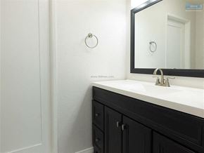 Sherman Oaks apartment for rent - A bathroom with a white sink and a mirror.