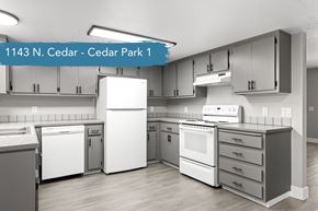 Chico apartment for rent - A modern kitchen with a white refrigerator, white oven, and white cabinets.