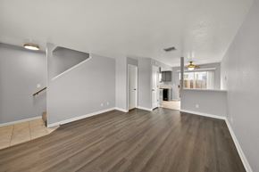 Redding apartment for rent - A room with wooden flooring and white walls.