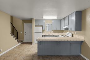 Chico apartment for rent - Kitchen with island and tile countertops at Cedar Park Apartments, Chico, California