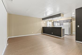 Open concept living and dining area with kitchen