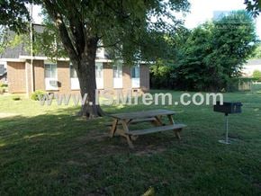 Columbia apartment for rent - A picnic table is in the middle of a grassy area.