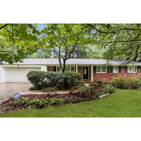 College Park house for rent - a home with a front yard and a tree