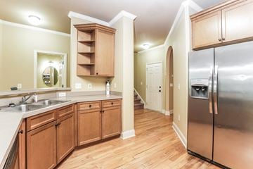 Stone Mountain house for rent - a kitchen with stainless steel appliances and wooden cabinets