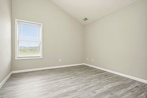Fairburn house for rent - A room with a window and wooden flooring.