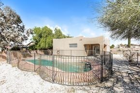 Vail house for rent - A house with a pool in the backyard.