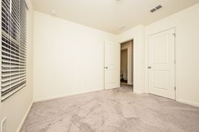 Mcdonough house for rent - A room with a carpeted floor and white walls.
