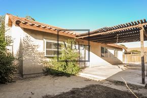 Lancaster house for rent - A house with a white exterior and a brown roof.