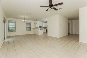 San Antonio house for rent - Empty room with a ceiling fan and tiled floor.