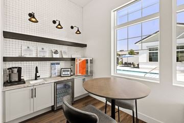 Phoenix apartment for rent - a kitchen and dining area with a large window and a table
