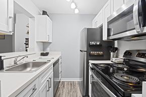 Lakeland apartment for rent - the preserve at ballantyne commons apartment kitchen with stainless steel appliances