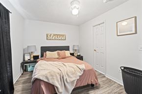 Lakeland apartment for rent - a bedroom with a bed and a closet