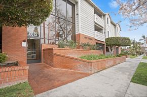 Santa Ana apartment for rent - A brick wall with a sign that says "2015" on it.